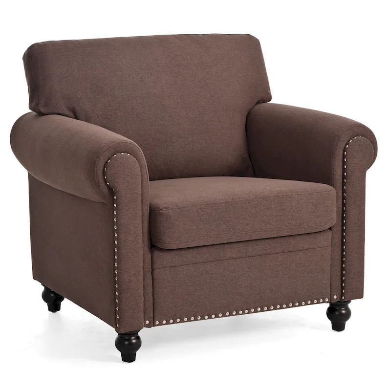 Sillón tapizado color café con brazos enrollados y tachuelas decorativas