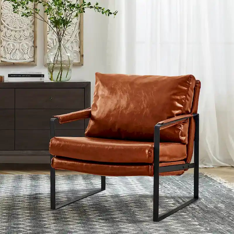 Sillón tapizado en PU con estructura de acero