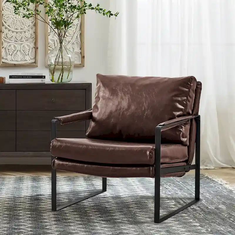 Sillón tapizado en PU con estructura de acero
