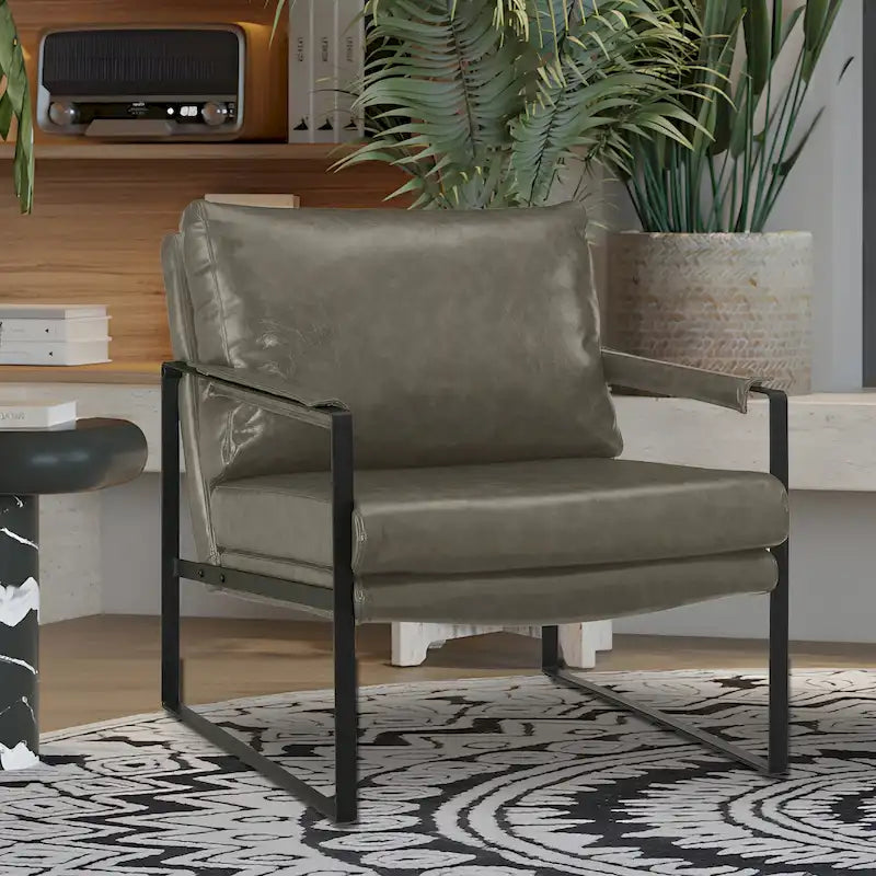 Sillón tapizado en PU con estructura de acero