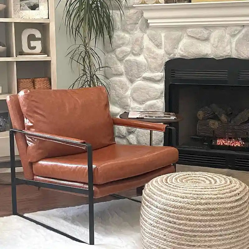 Sillón tapizado en PU con estructura de acero