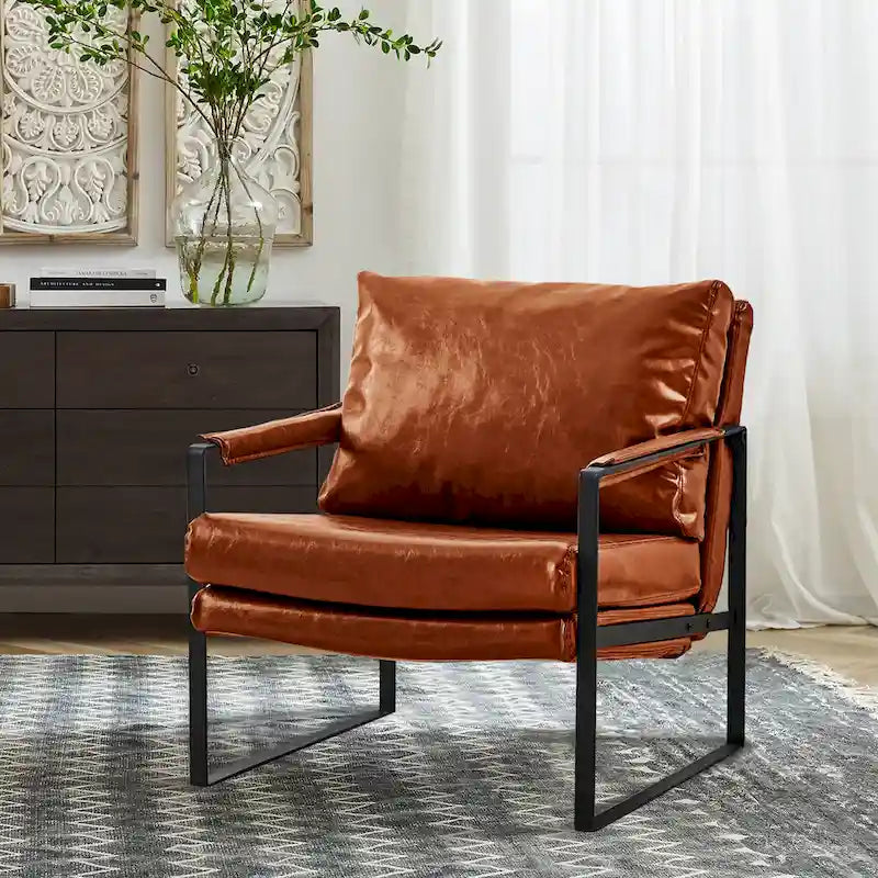 Sillón tapizado en PU con estructura de acero