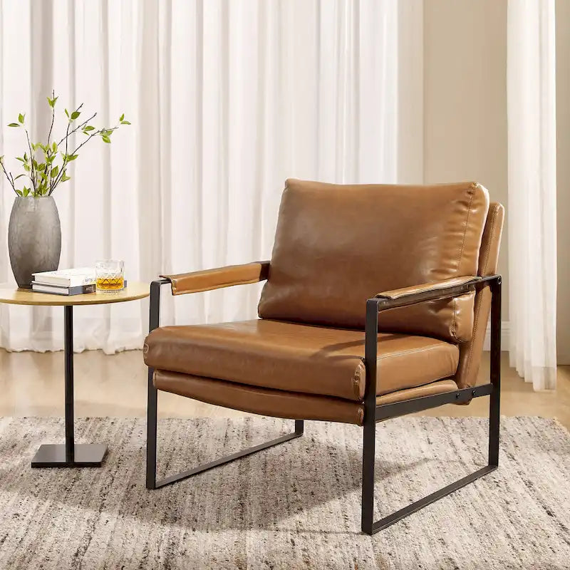 Sillón tapizado en PU con estructura de acero