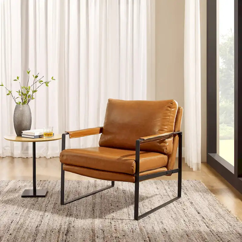 Sillón tapizado en PU con estructura de acero