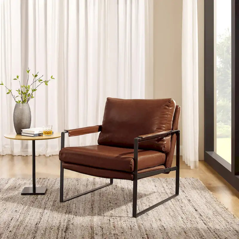 Sillón tapizado en PU con estructura de acero
