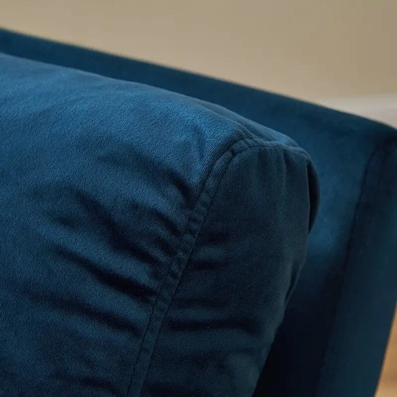 Sillón tapizado en PU con estructura de acero