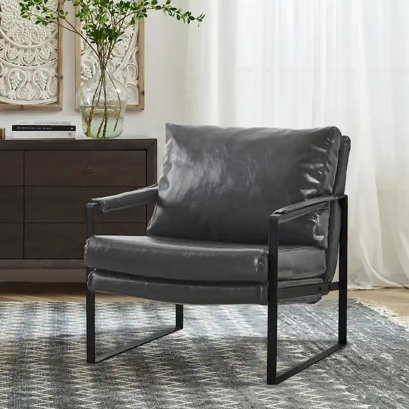 Sillón tapizado en PU con estructura de acero