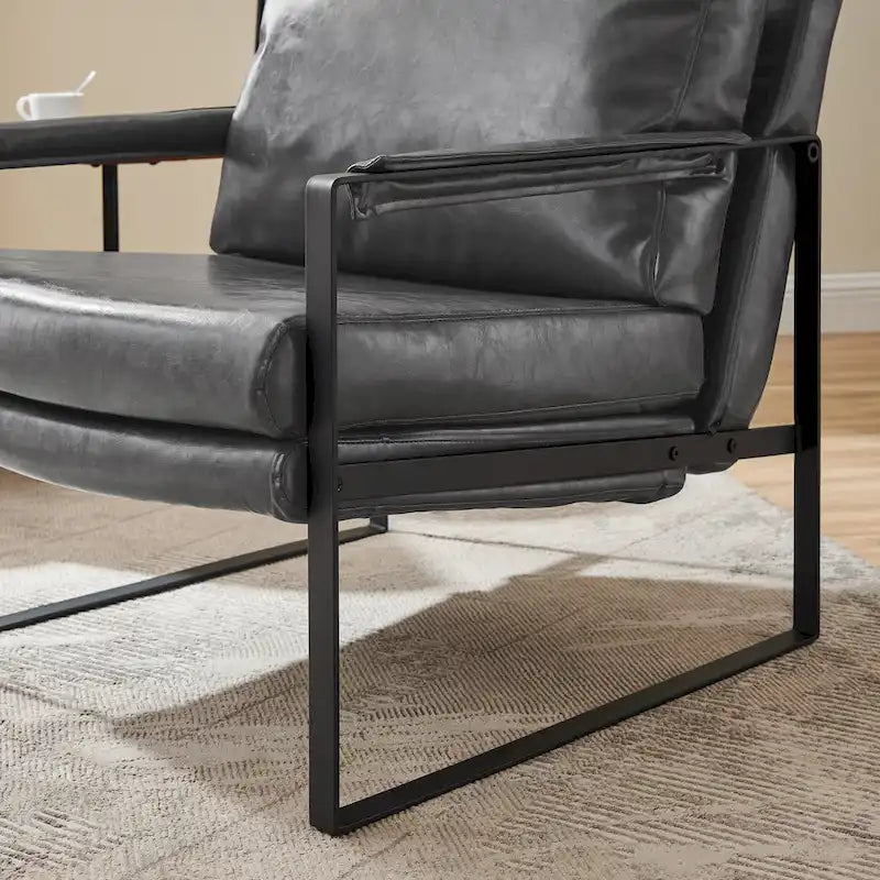 Sillón tapizado en PU con estructura de acero