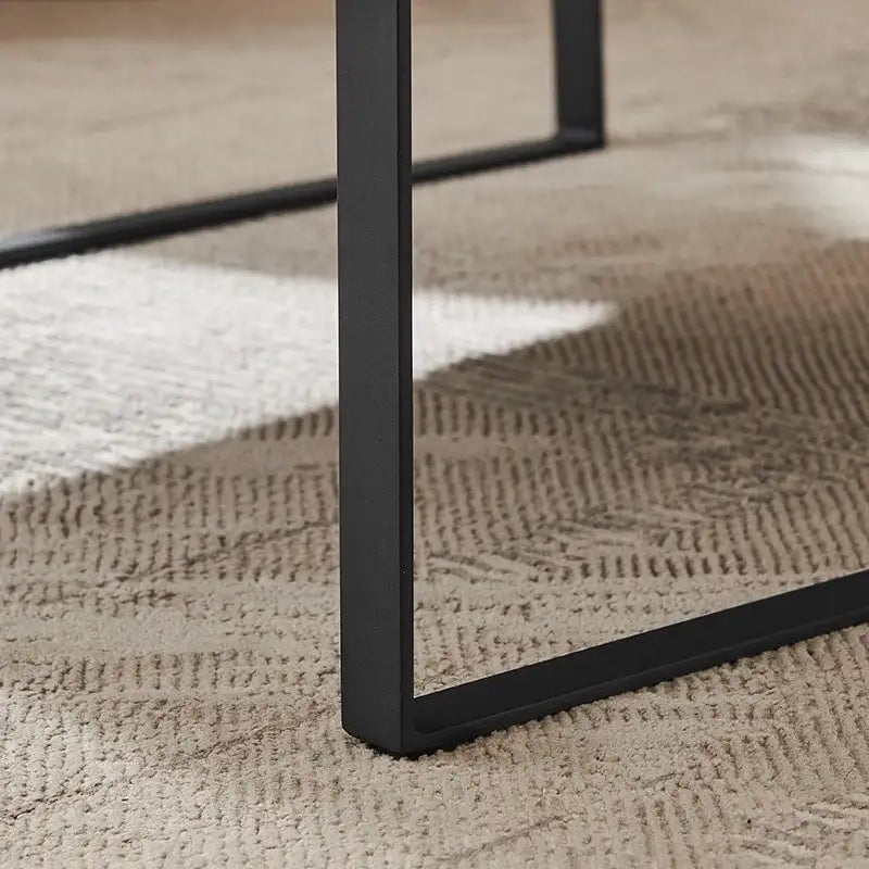 Sillón tapizado en PU con estructura de acero