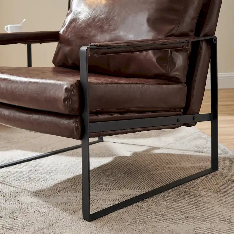 Sillón tapizado en PU con estructura de acero