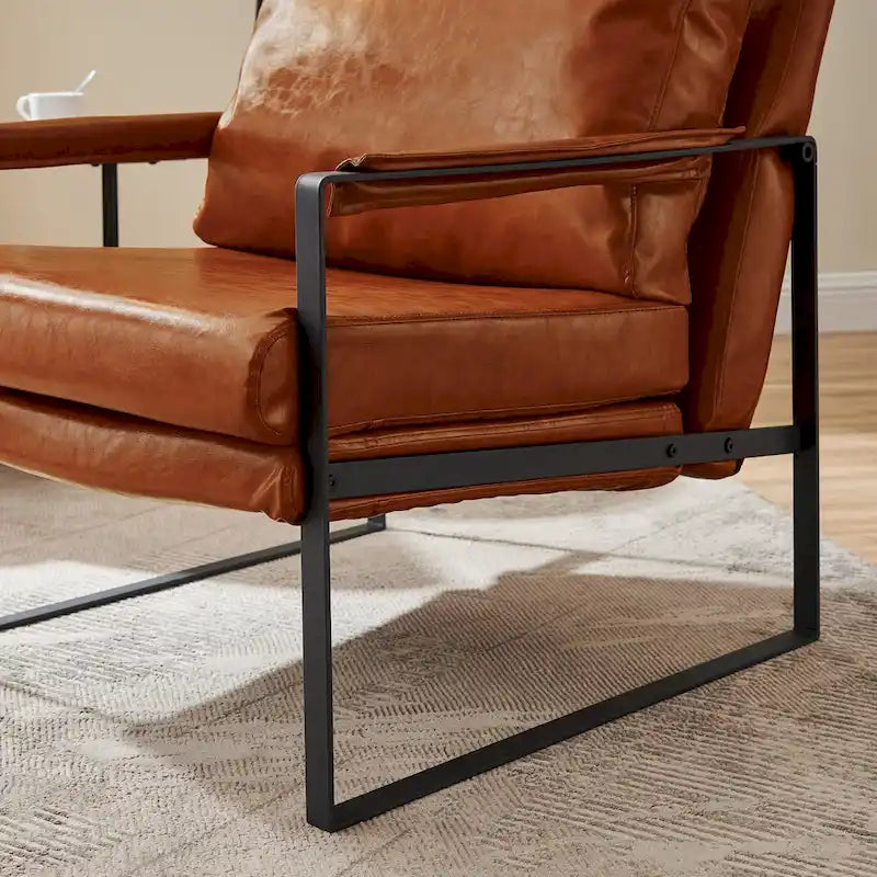 Sillón tapizado en PU con estructura de acero